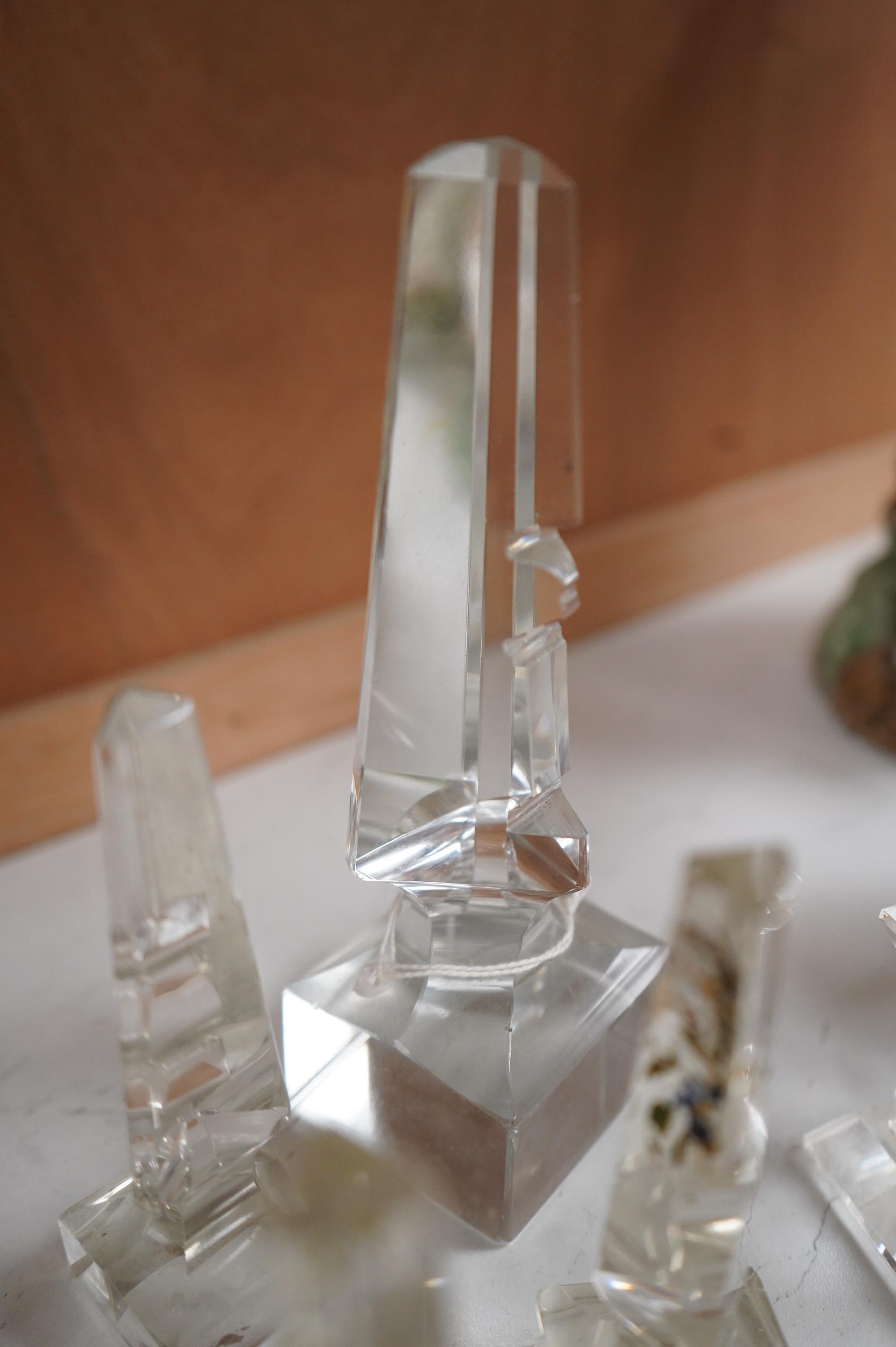 Twelve Victorian glass deceptive obelisks, and two later glass obelisk ornaments, largest pair 21cm high